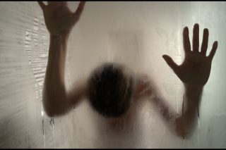 Hands on glass
