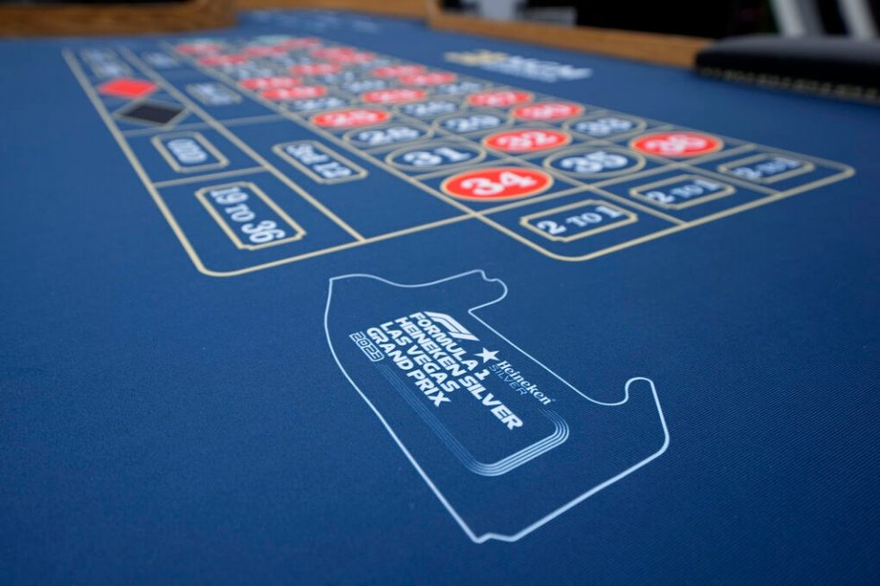 A sign for the Formula One Las Vegas Grand Prix adorns a roulette table