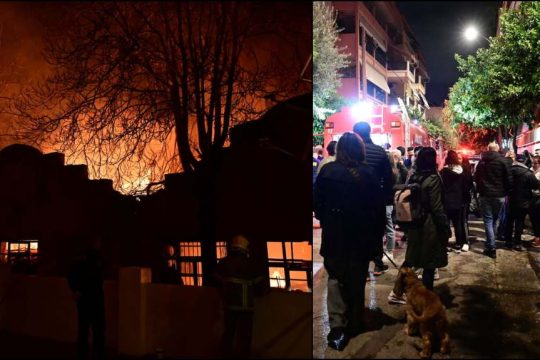 Οι περίοικοι, που ανακάστηκαν να εκκενώσουν τα διαμερίσματά τους, παρακολουθούν με αγωνία την εξέλιξη της πυρκαγιάς