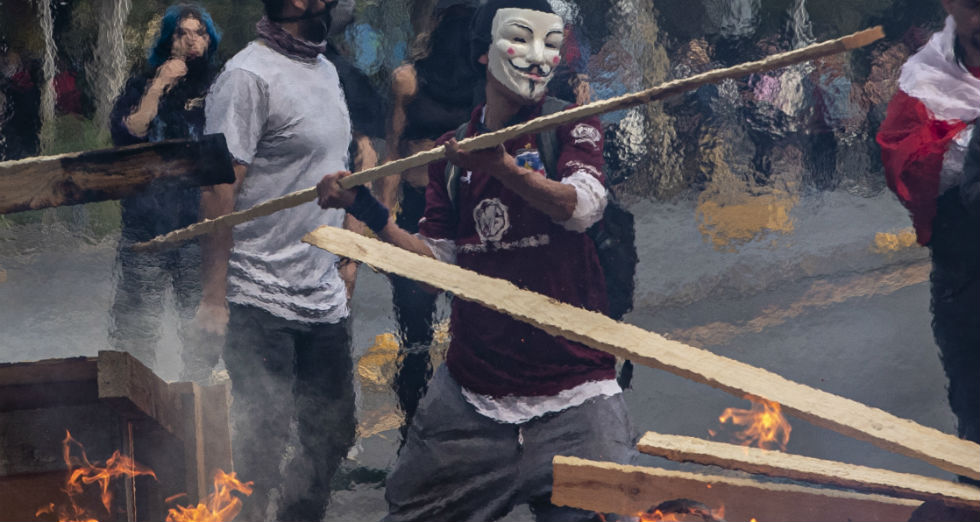 Τρεις νεκροί σε ταραχές στο Σαντιάγο
