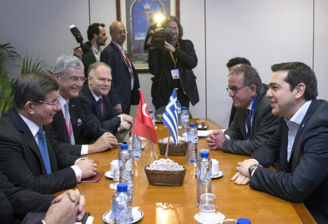 Βρυξέλλες, Σμύρνη και επιστροφή στην Αθήνα